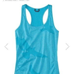 Oiselle Womens turquoise racer back tank top, large.